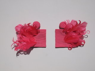feather earrings in barbie pink
